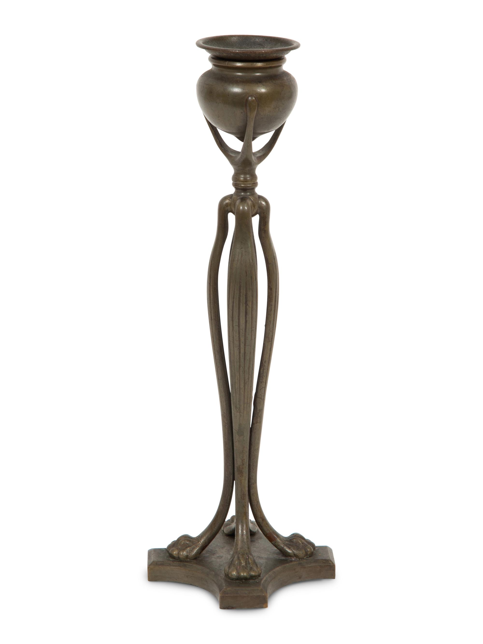 A Tiffany Studios Cat's Paw Bronze Candlestick