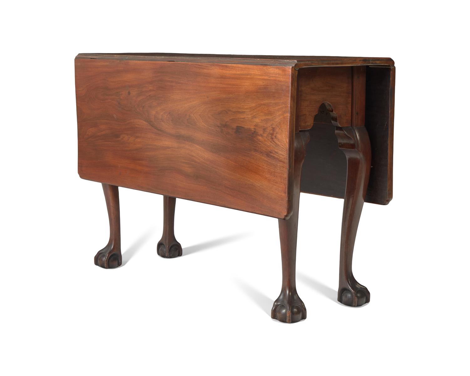 A Chippendale Carved and Figured Mahogany Drop-Leaf Dining Table, Philadelphia, PA, Circa 1775