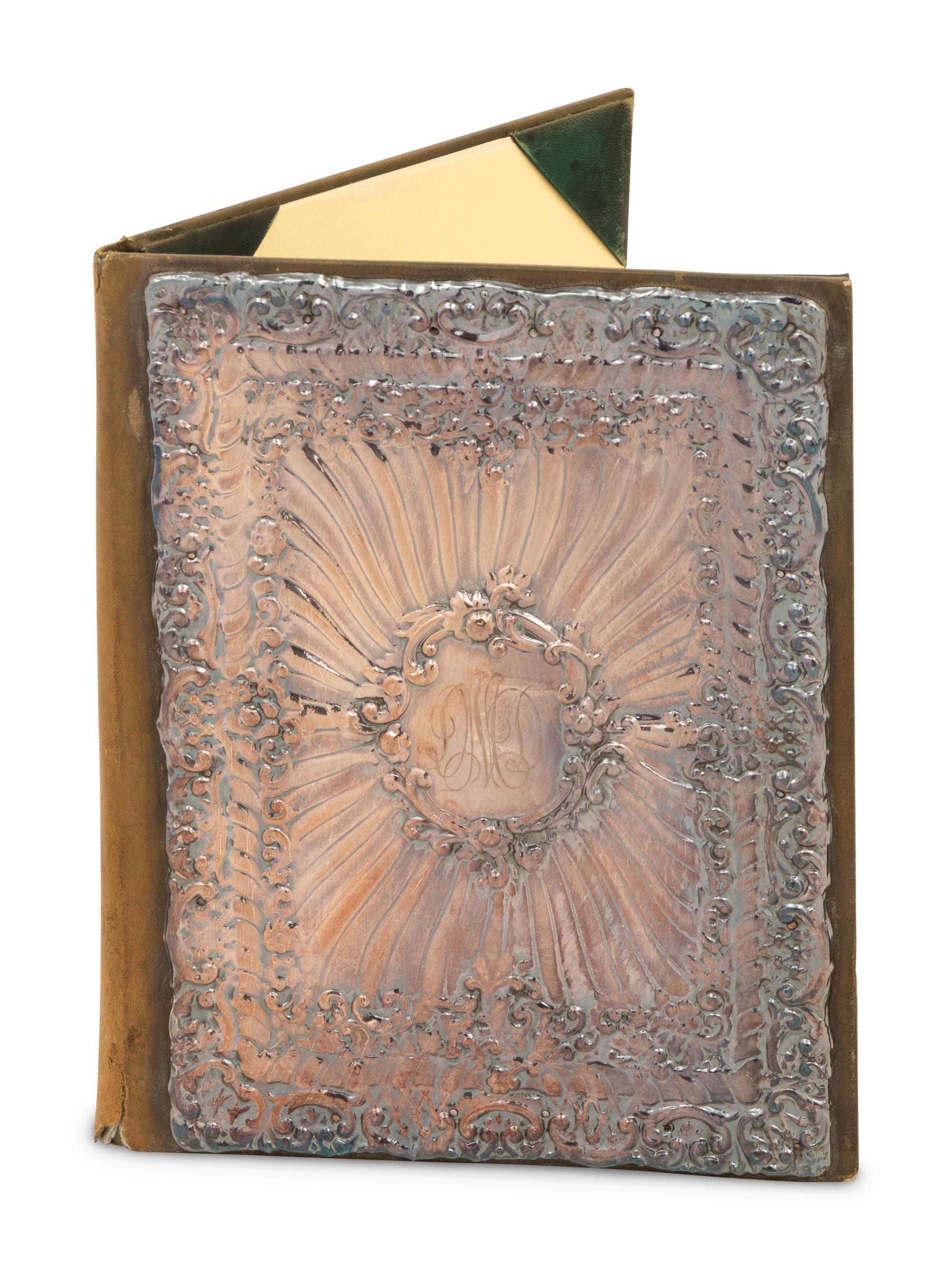 A Repoussé Silver-Mounted Leather Portfolio