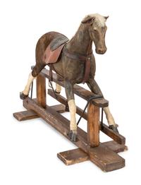 A Child's Horse Hair Upholstered Riding Toy