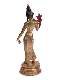 A Gilt Bronze and Rock Crystal Standing Deity