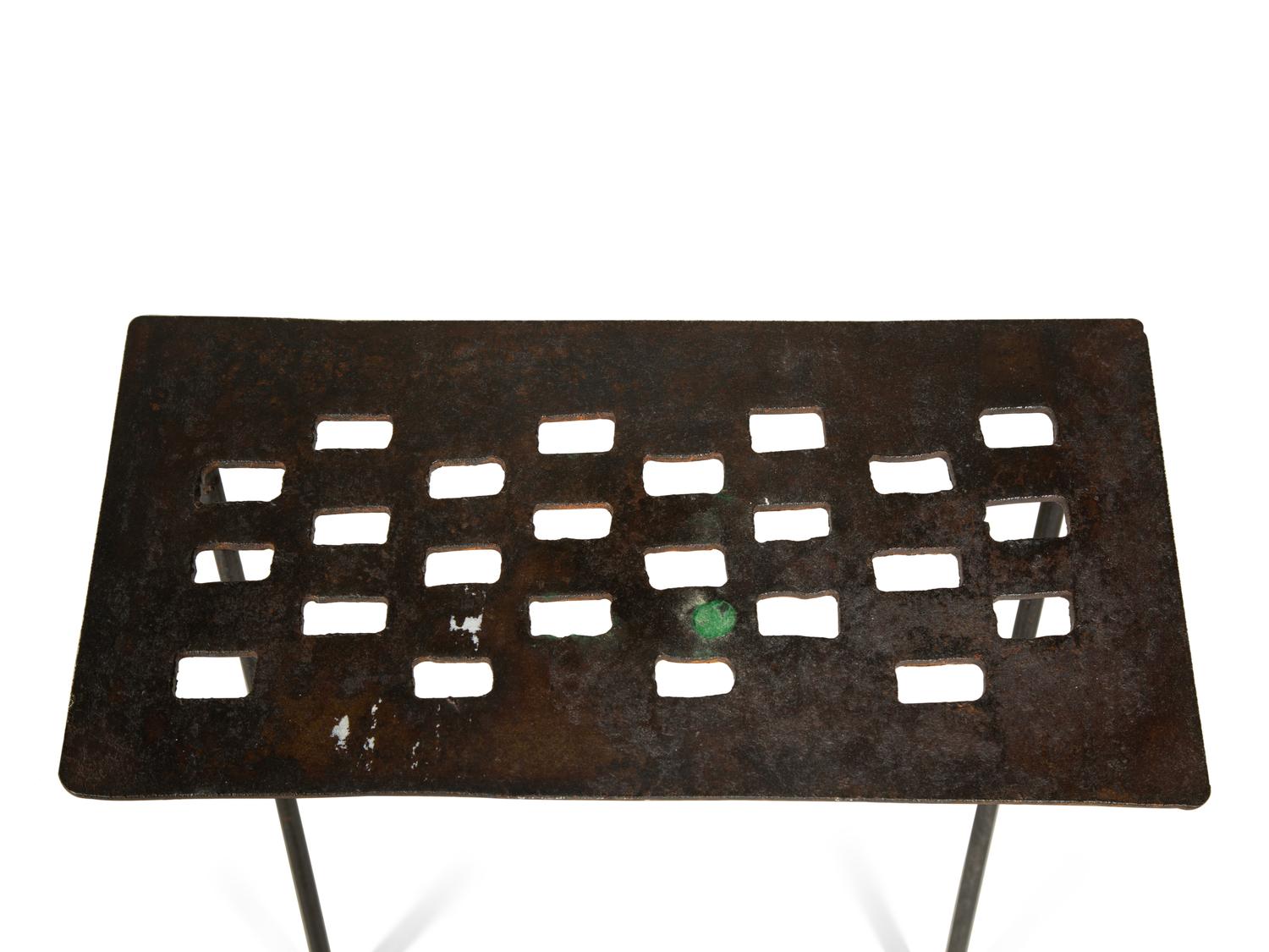 A Set of Three Cut-Out Metal Nesting Tables