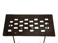 A Set of Three Cut-Out Metal Nesting Tables