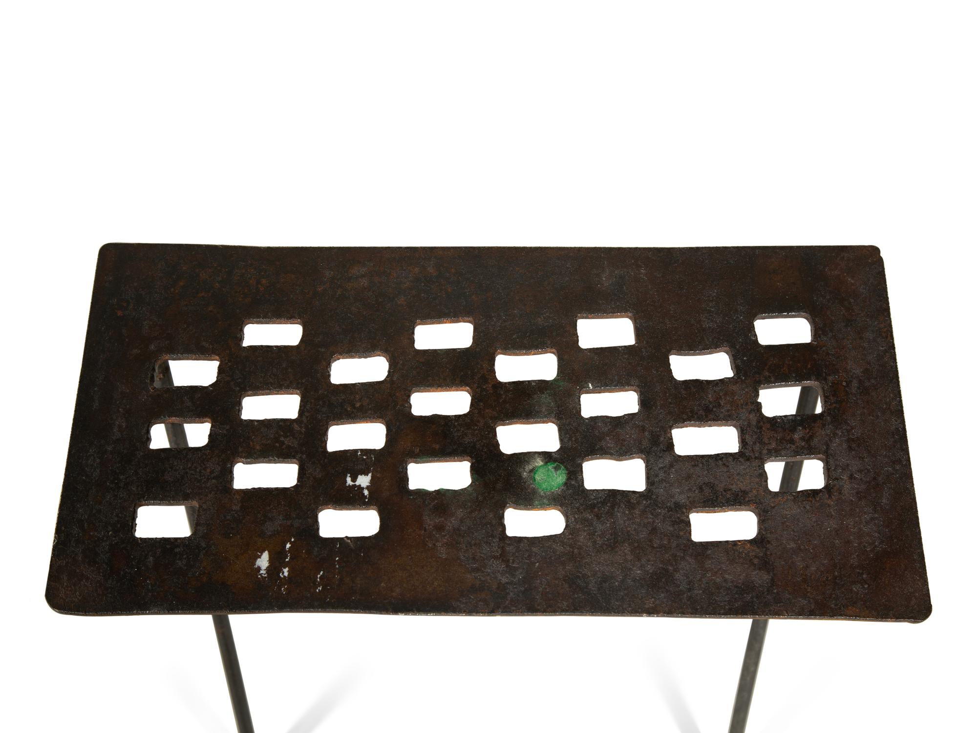 A Set of Three Cut-Out Metal Nesting Tables