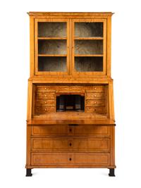 A Biedermeier Figured Walnut Secretary Bookcase