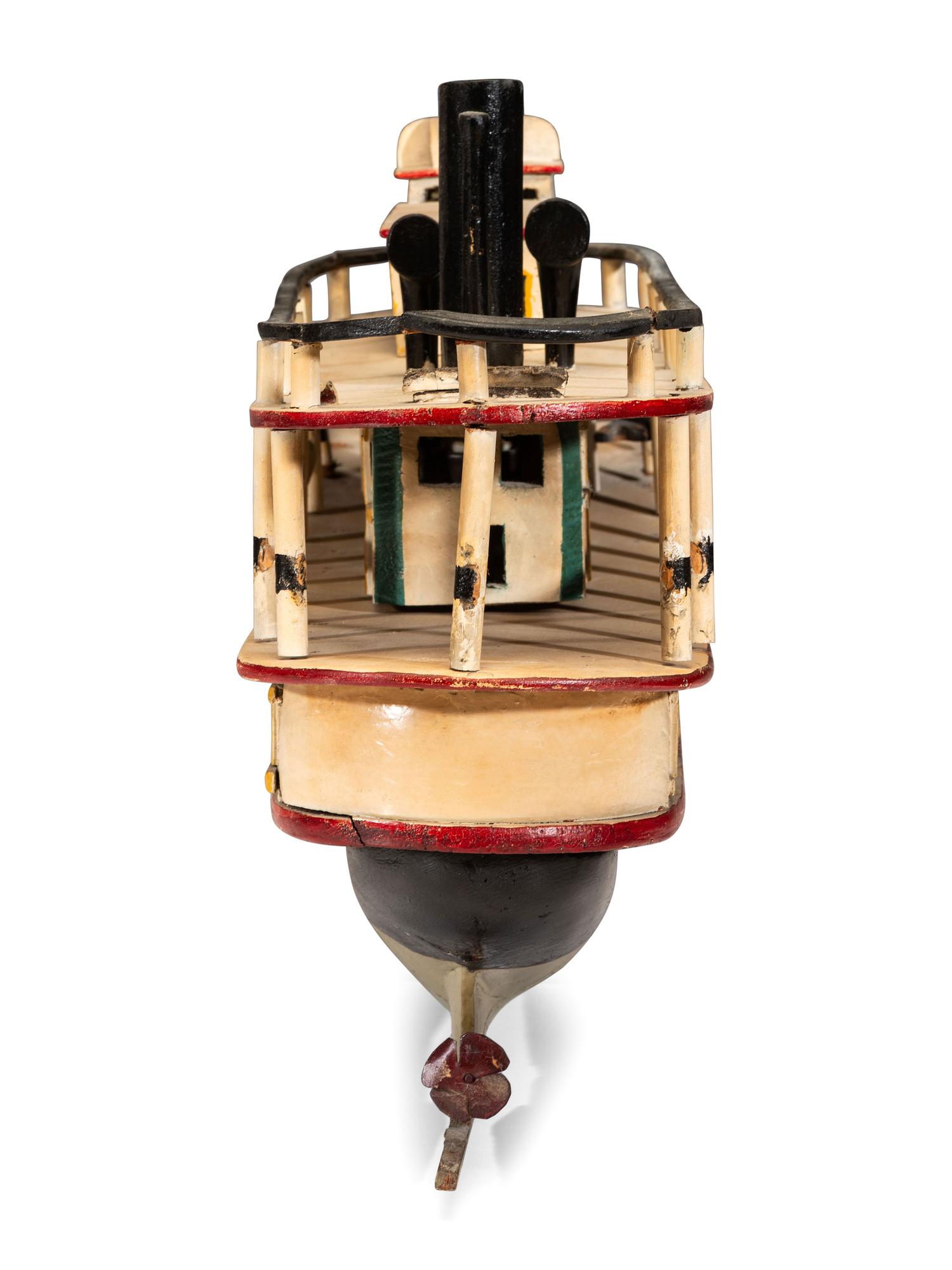 A Carved and Painted Wood Steamboat Model