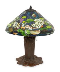 A Gilbertson's Studio Leaded Glass and Bronze Water Lily Lamp