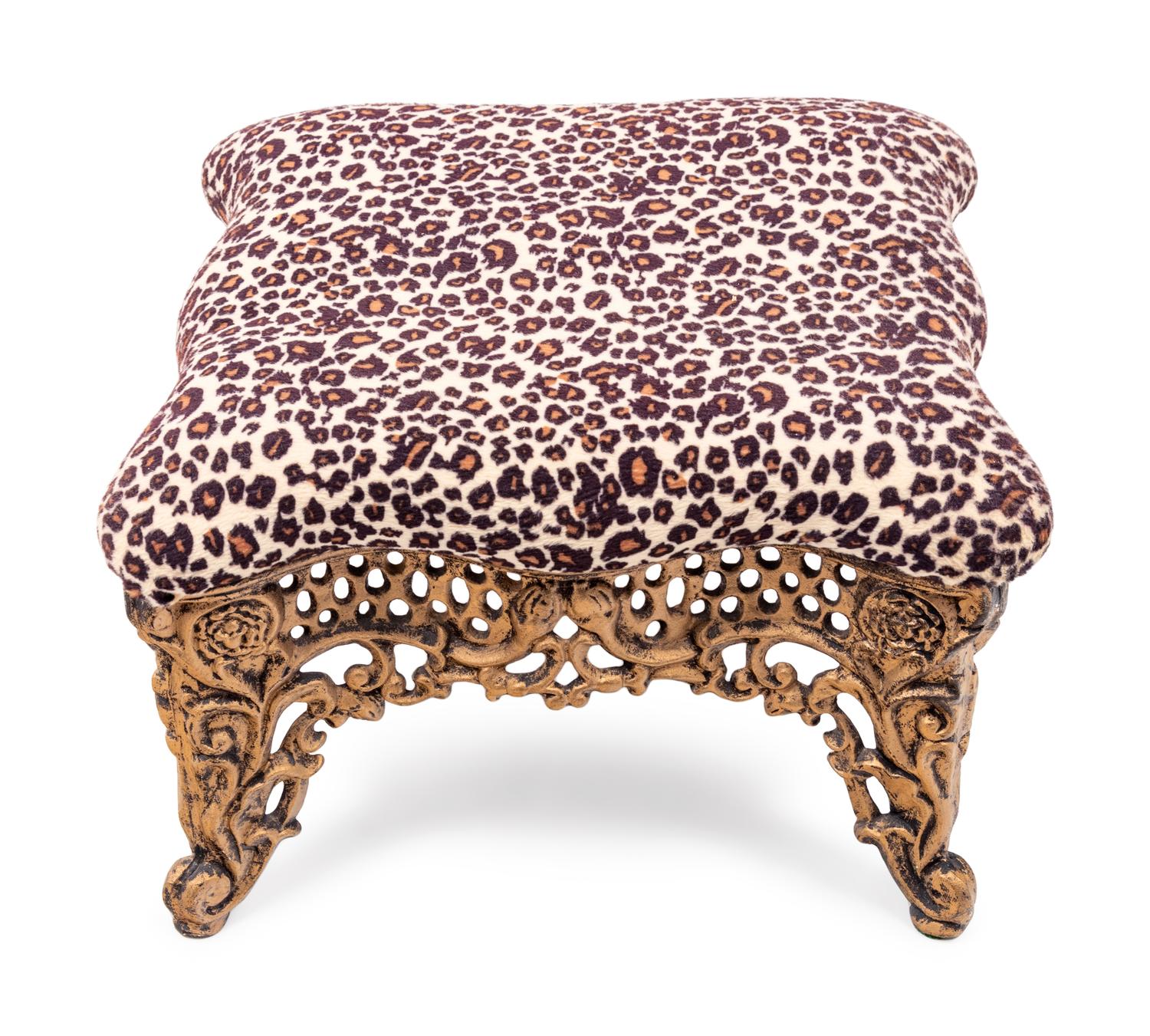 A Brass Foot Stool with Cheetah Print Upholstery