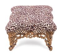 A Brass Foot Stool with Cheetah Print Upholstery