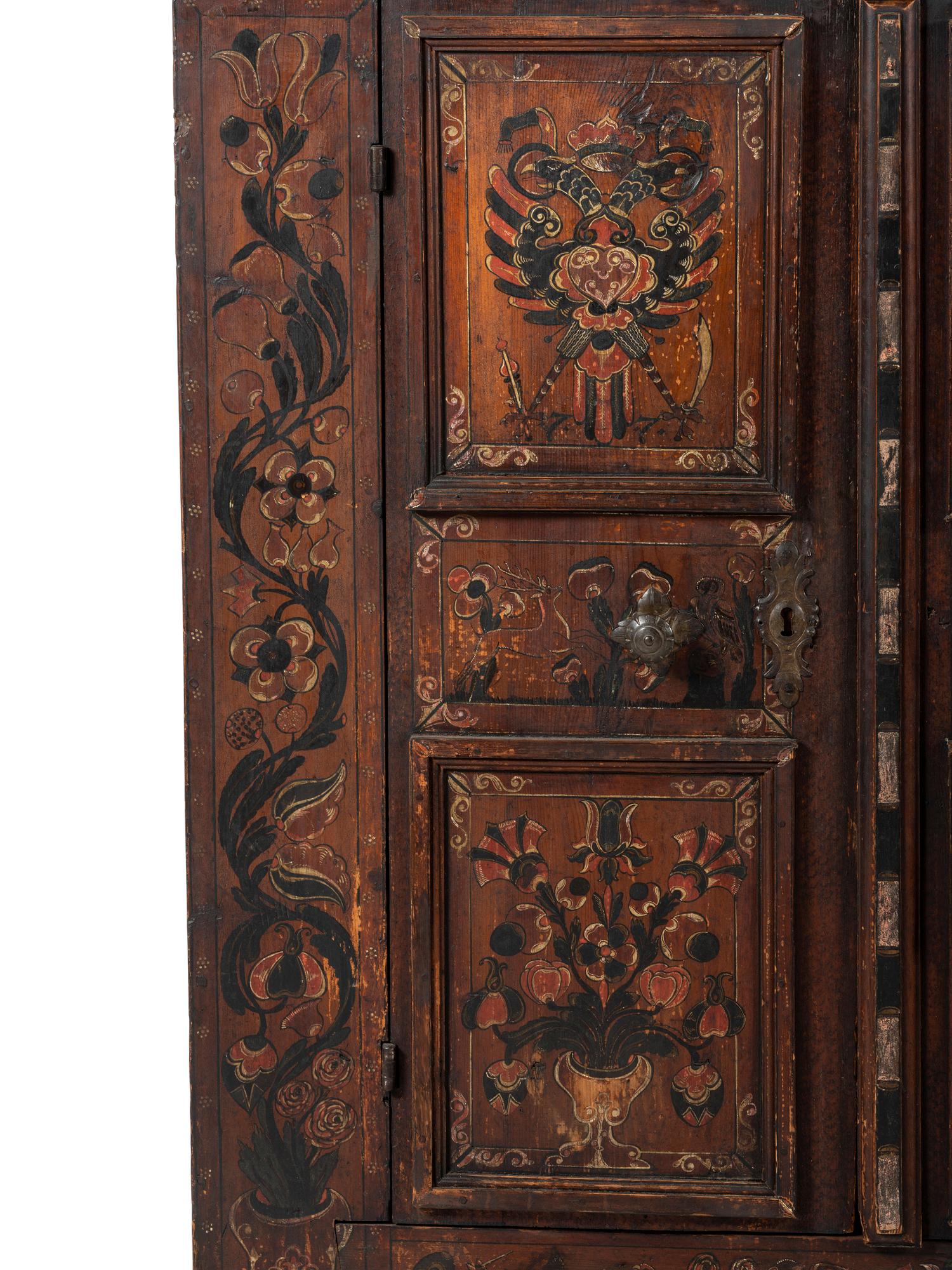A Continental Carved and Paint Decorated Wardrobe
