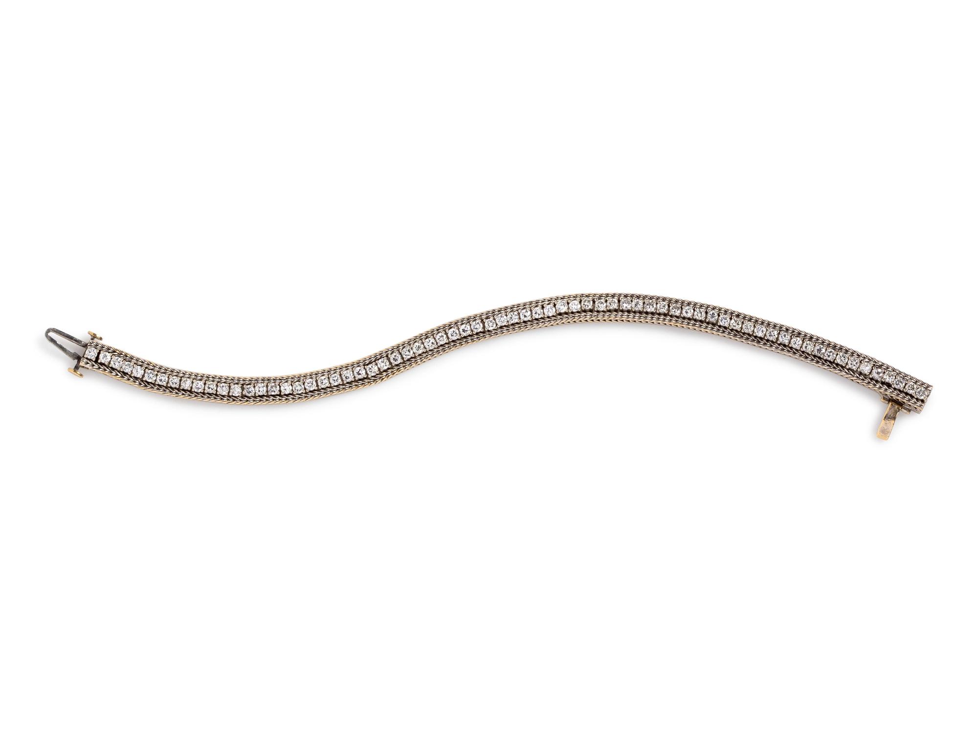 A 14 Karat White Gold and Diamond Bracelet,