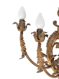 A Pair of Régence Style Gilt Metal Five-Light Sconces