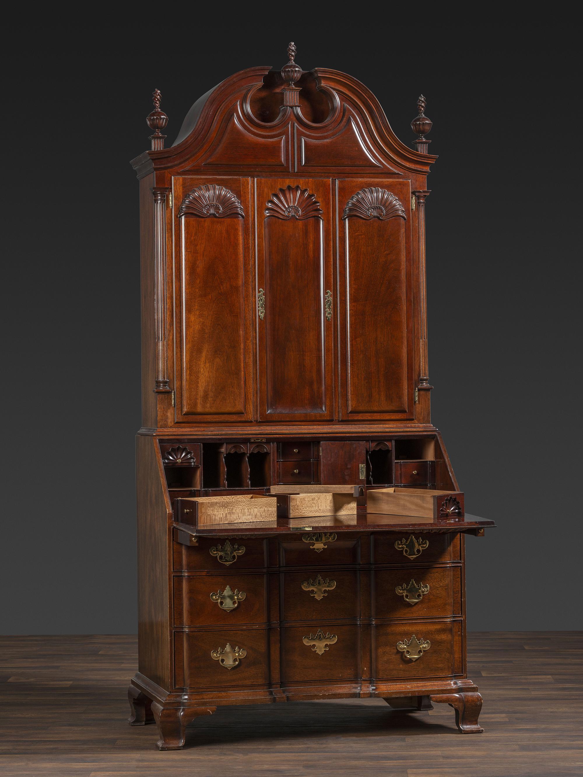 A Kindel Chippendale Revival Shell-and-Block Front Desk-and-Bookcase