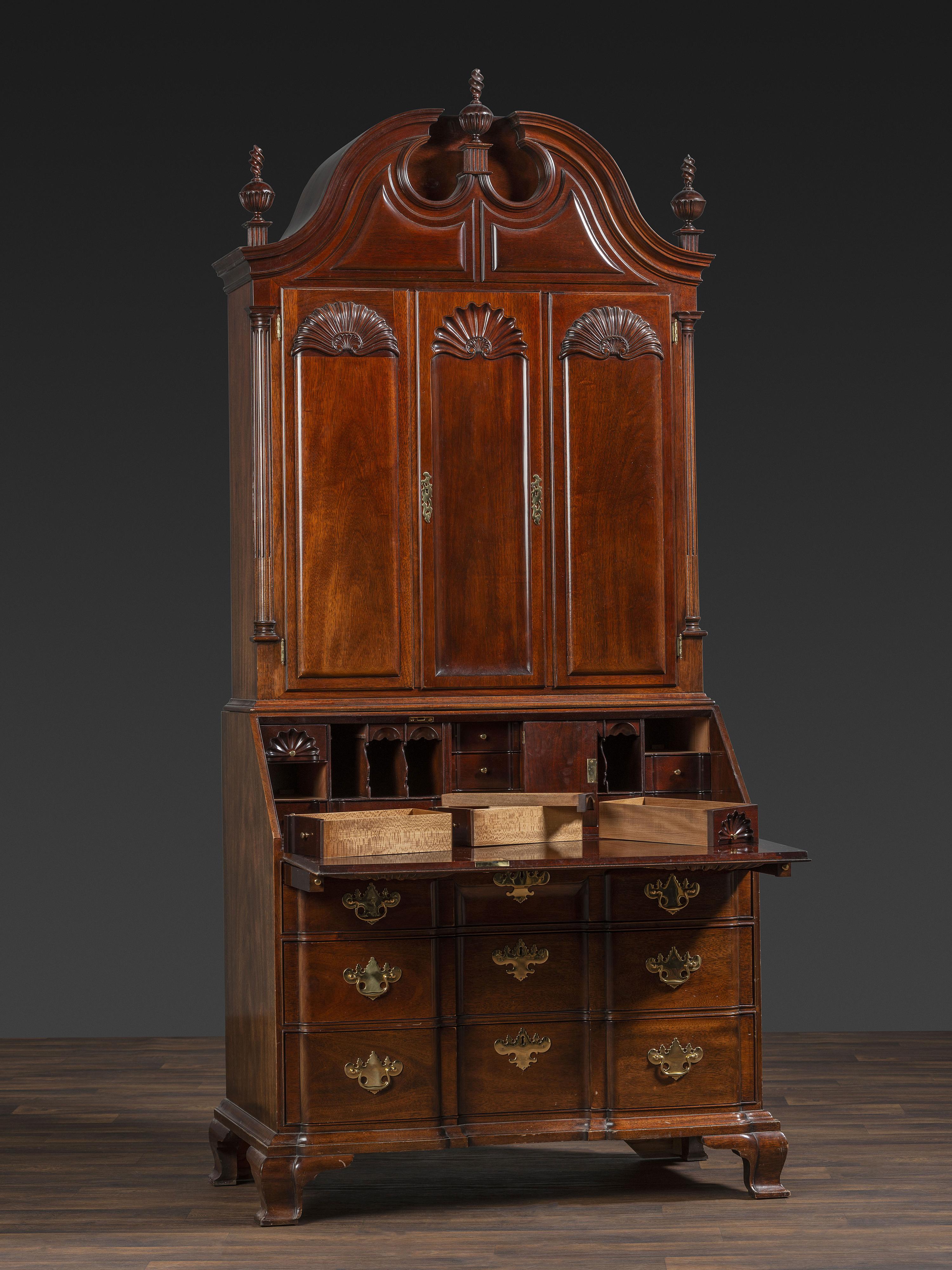 A Kindel Chippendale Revival Shell-and-Block Front Desk-and-Bookcase