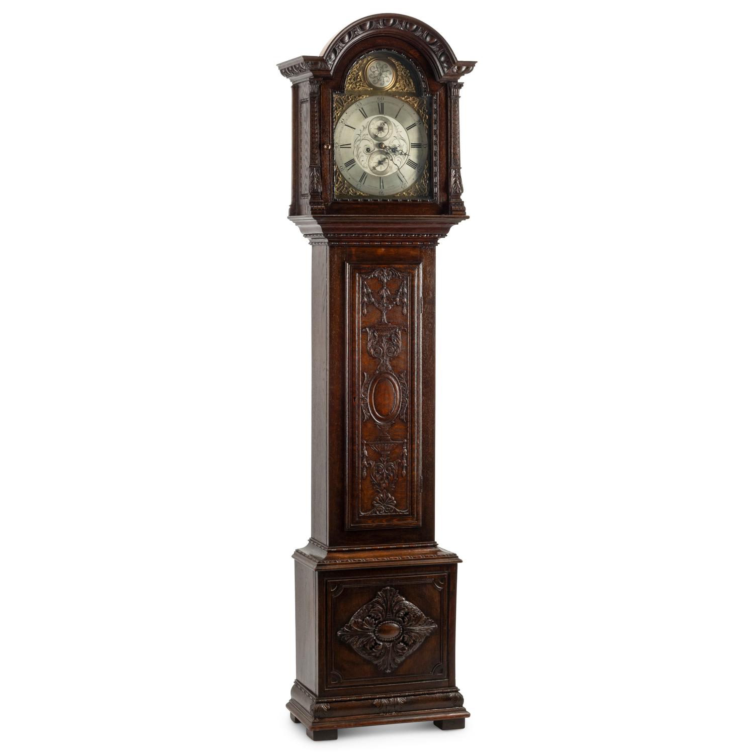 An English Carved Oak Tall Case Clock