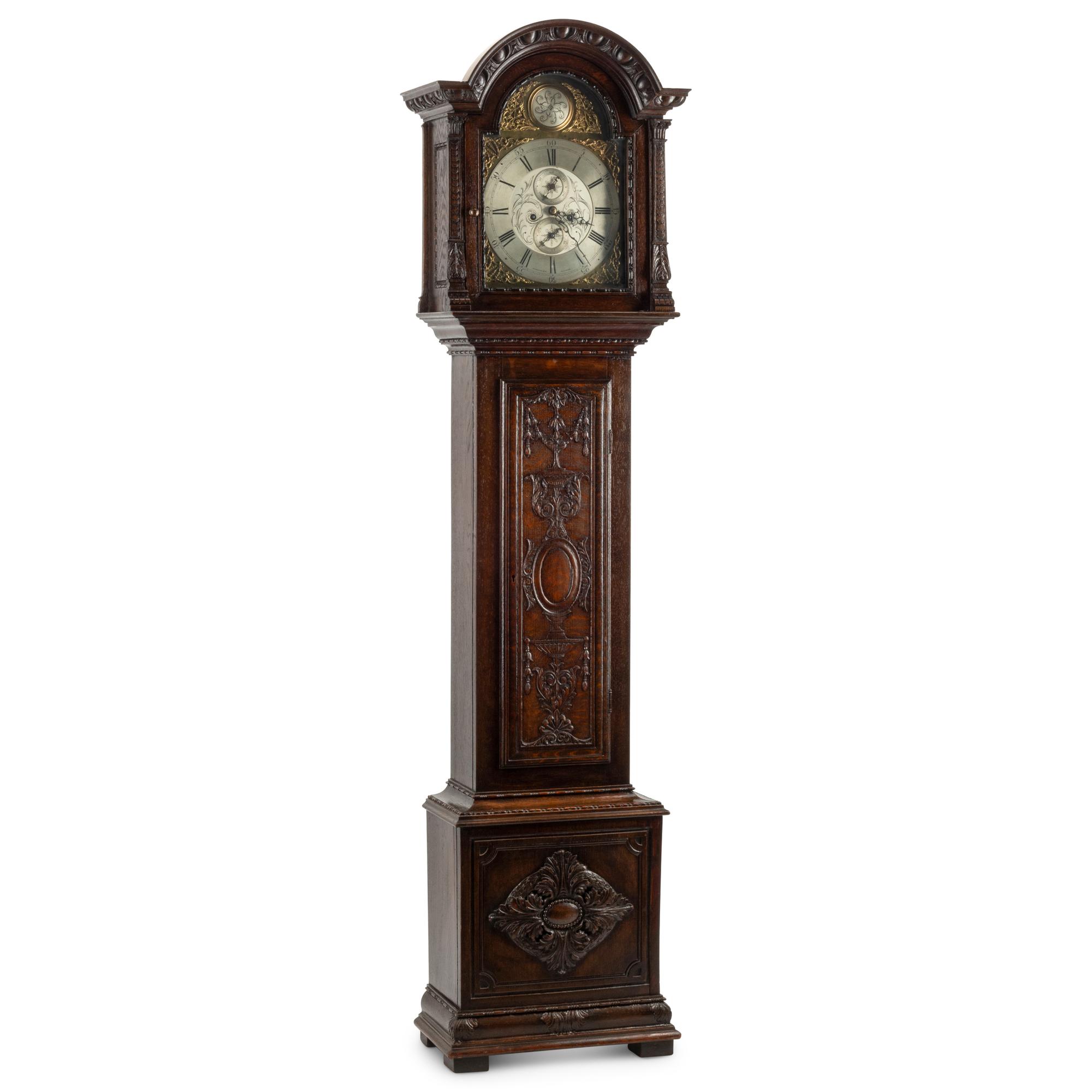 An English Carved Oak Tall Case Clock