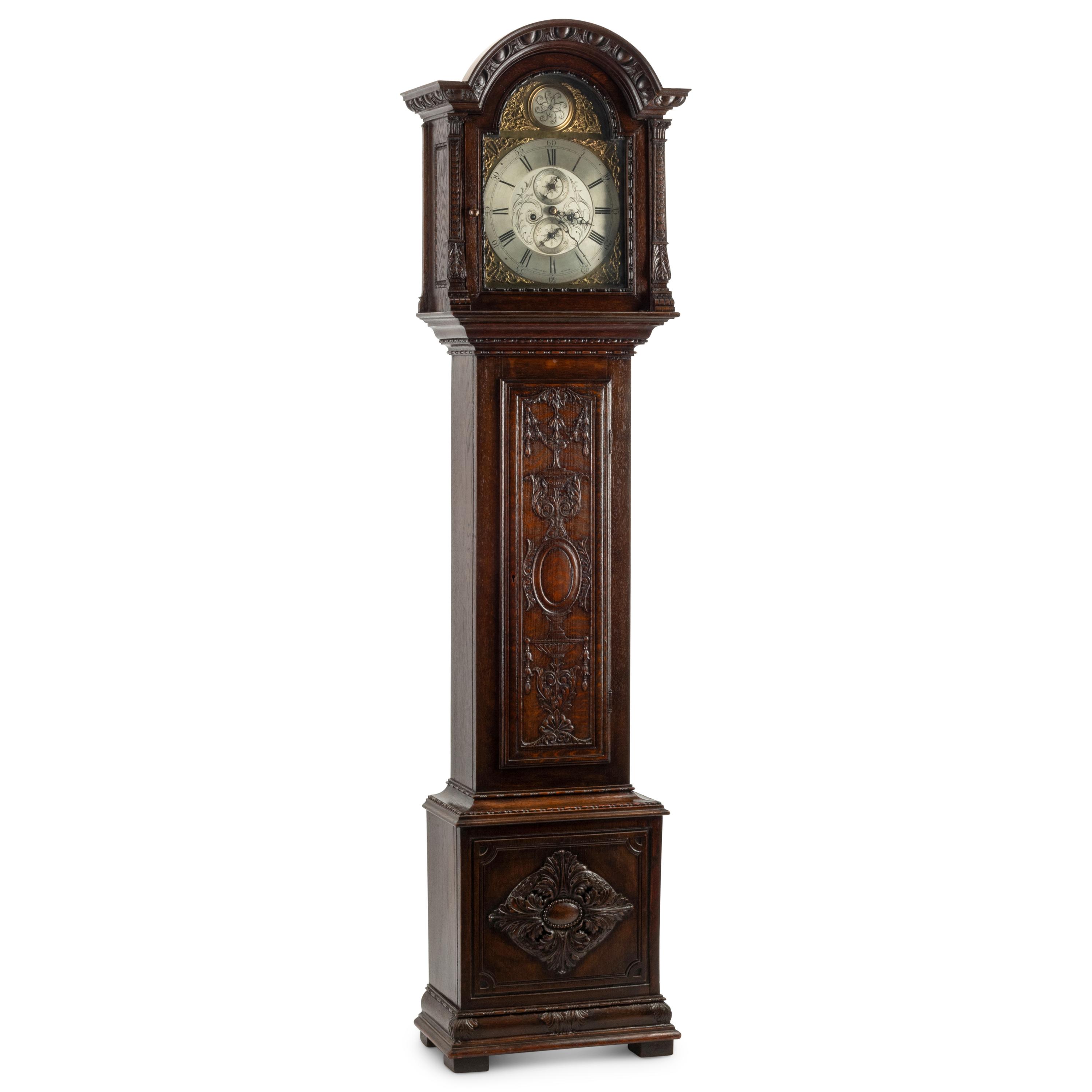 An English Carved Oak Tall Case Clock