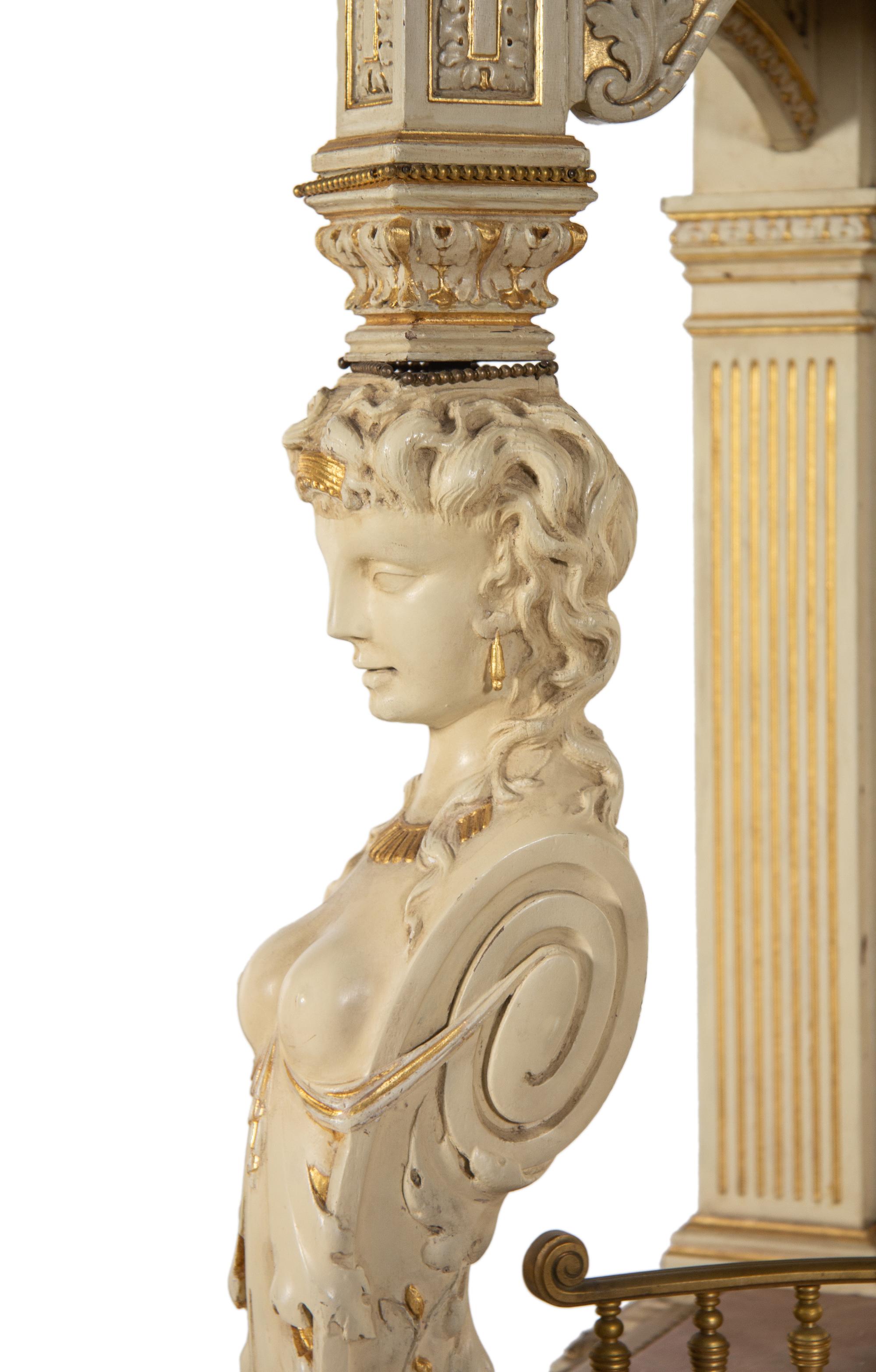 A Fine Renaissance Revival Parcel Gilt and Ivory-Painted Cabinet