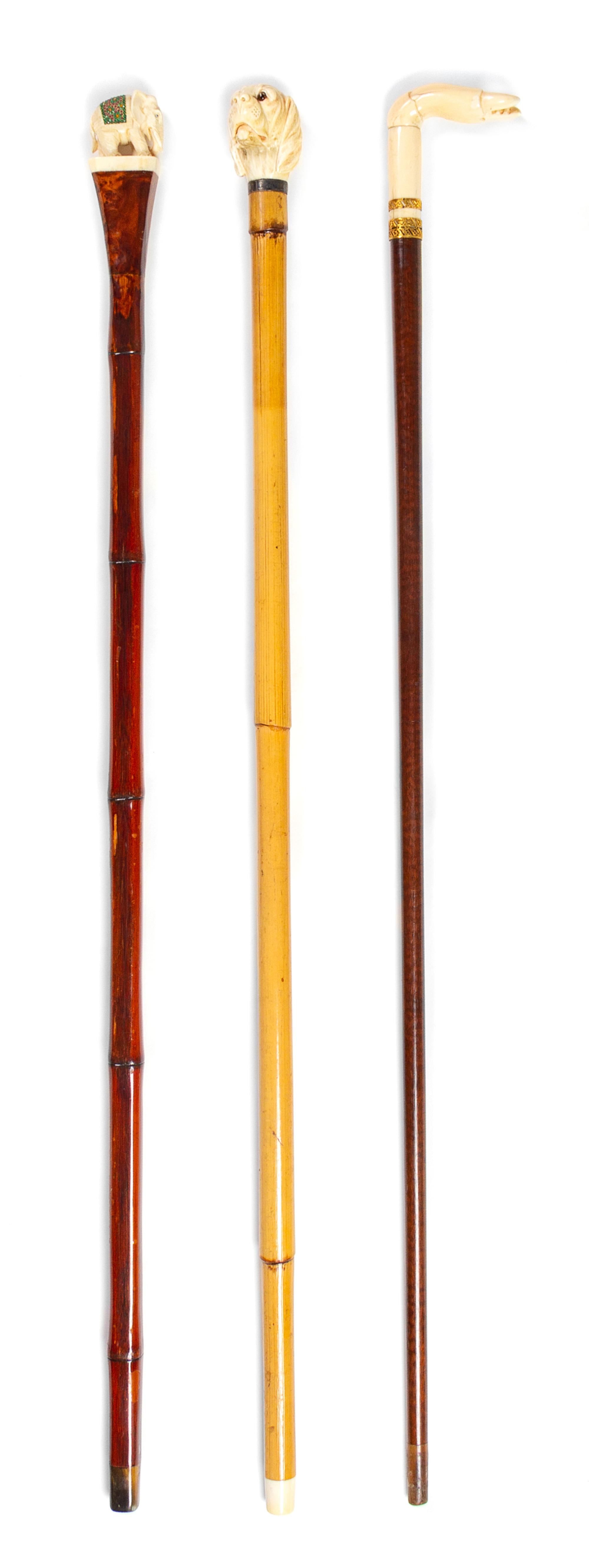 Three Continental Carved Zoomorphic Walking Sticks Length of longest 36 inches. — LATE 19TH/EARLY 20TH CENTURY