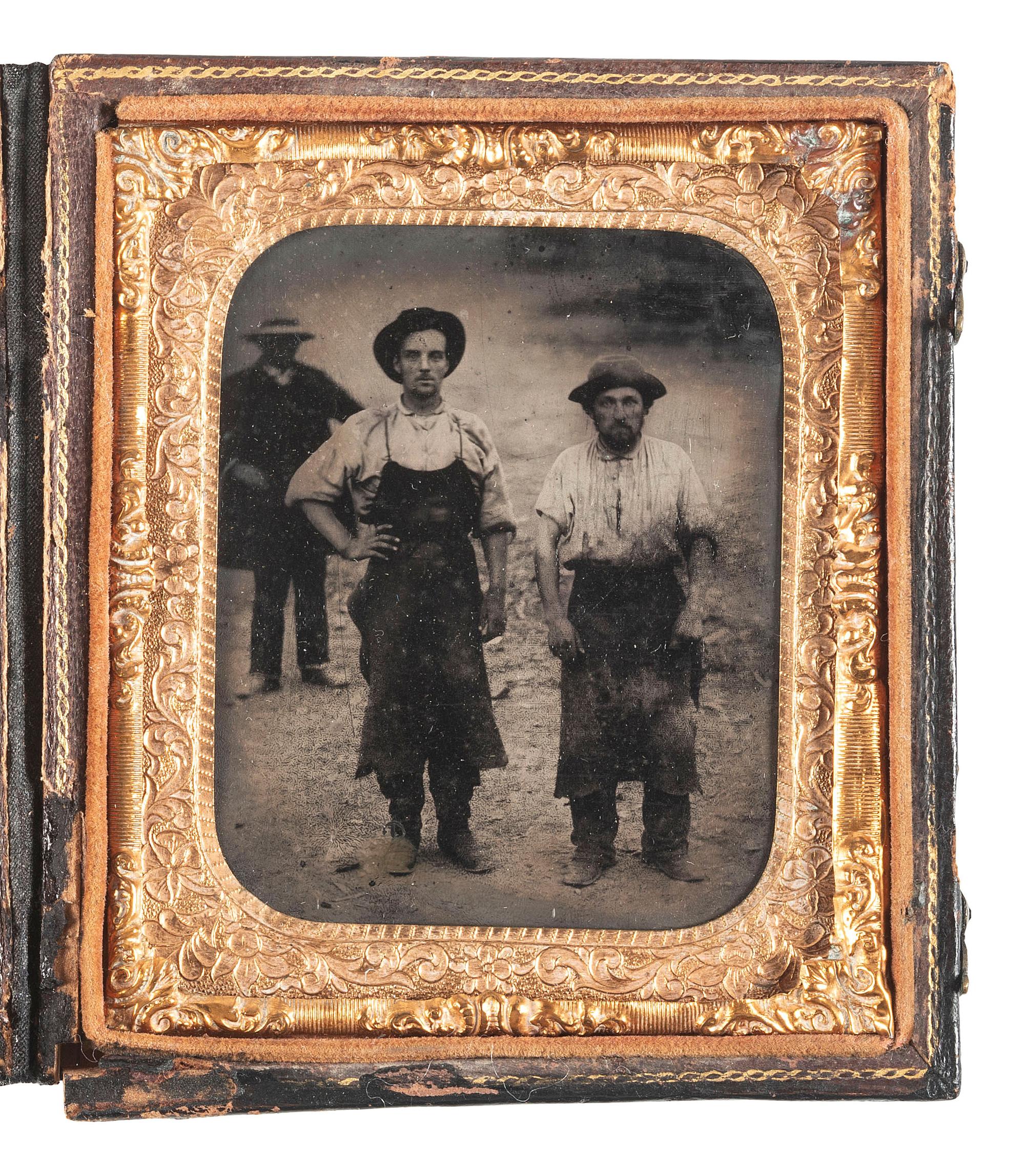 [CIVIL WAR]. Sixth plate outdoor tintype of possible military farriers wearing long leather aprons.