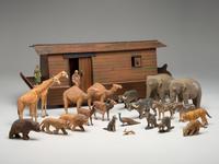 A Folk Art Carved Noah's Ark with Lift-Off Cover and Twenty-Four Figures