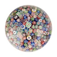 A Baccarat Close Packed Millefiori and Silhouette Glass Paperweight