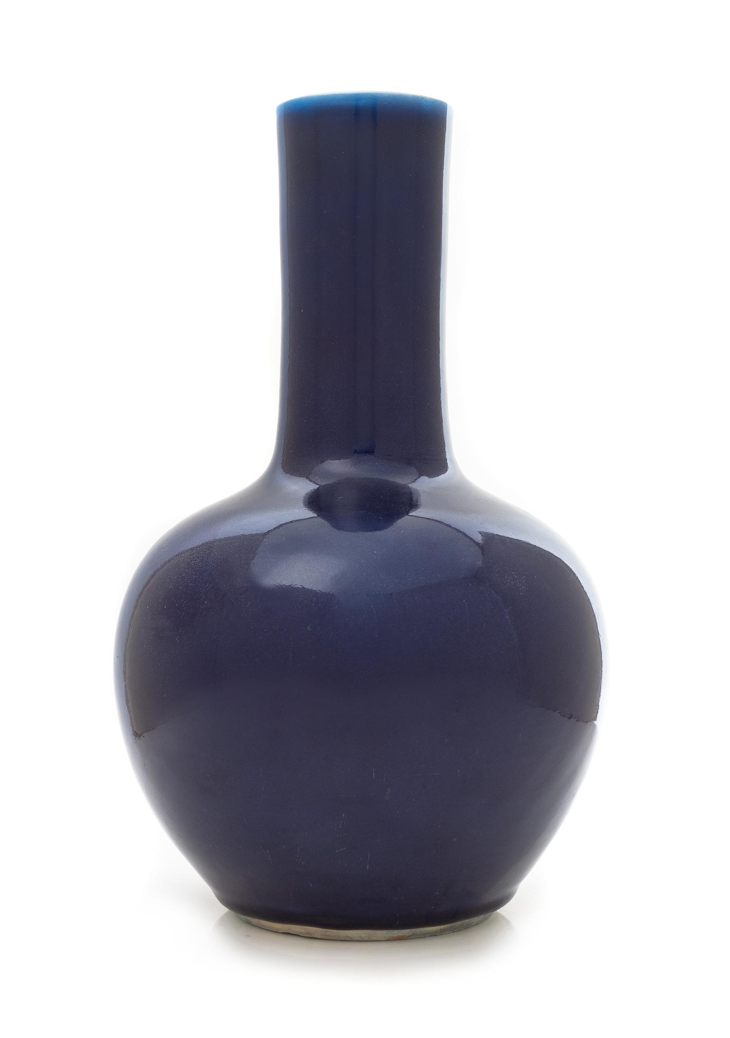 A Blue Glazed Porcelain Bottle Vase Height 13 1/4 inches. — 19TH CENTURY