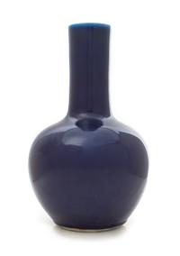 A Blue Glazed Porcelain Bottle Vase Height 13 1/4 inches. — 19TH CENTURY