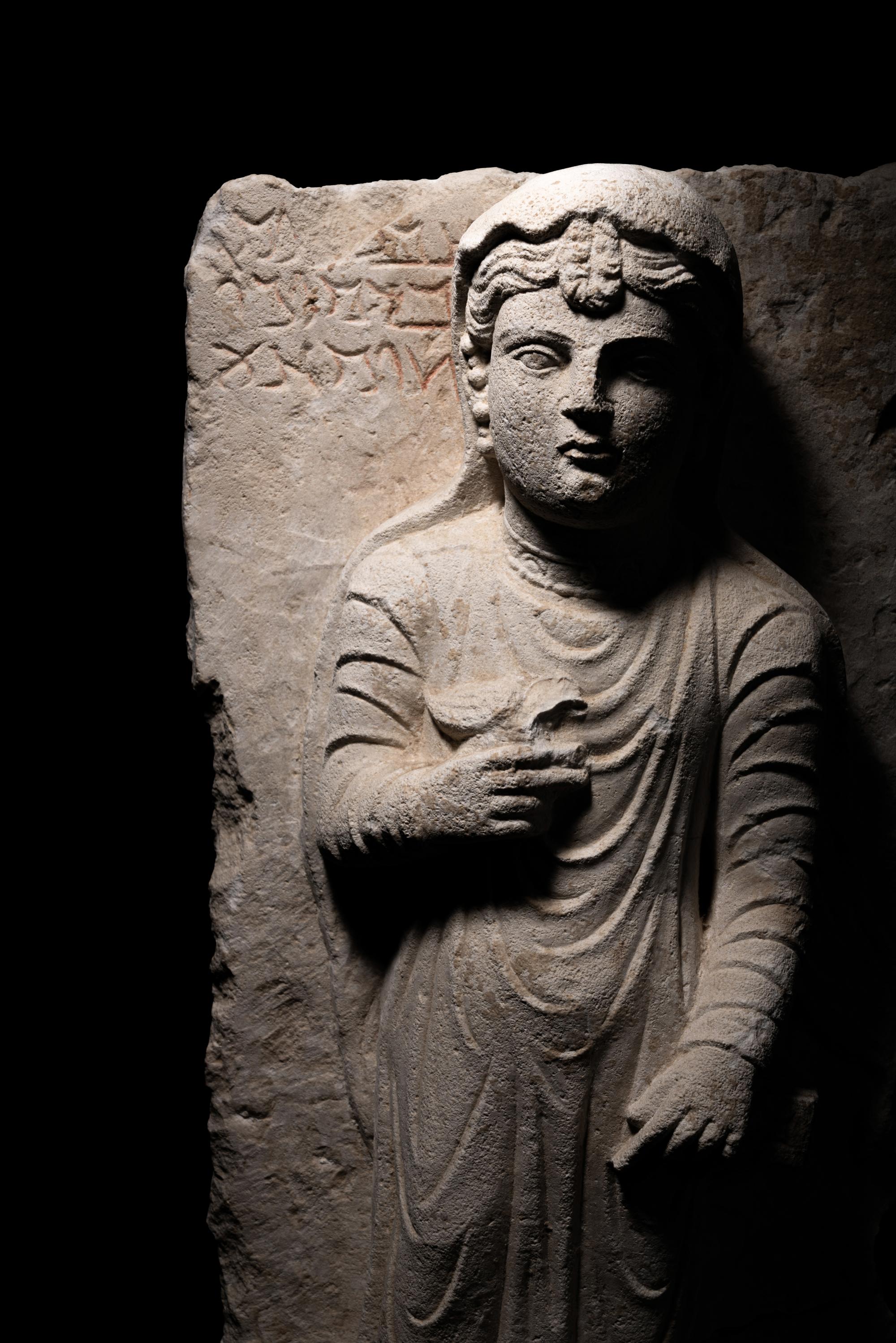 A Palmyran Limestone Relief of a Woman