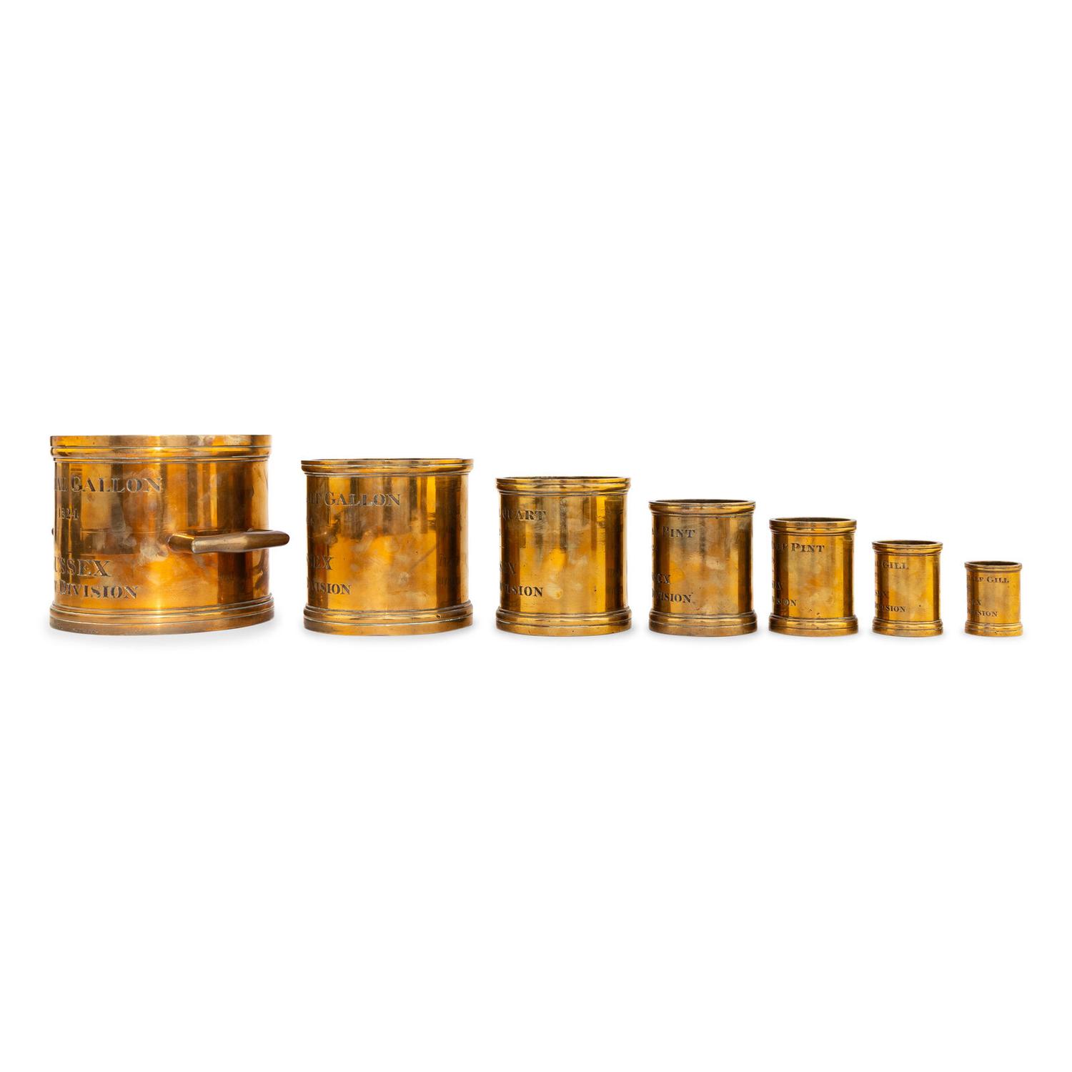 A Set of Seven English Brass Imperial Standard Measures