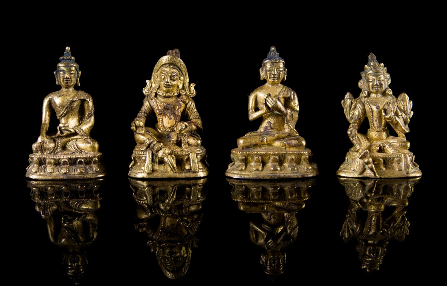 Four Small Sino-Tibetan Gilt Bronze Figures Height of each 1 5/8 inches. — 19TH CENTURY