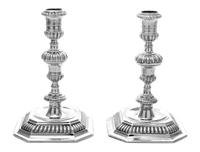 A Pair of William III Silver Candlesticks, John Laughton, London, 1701, each having a baluster stem gadroon banded knops, raised on a c
