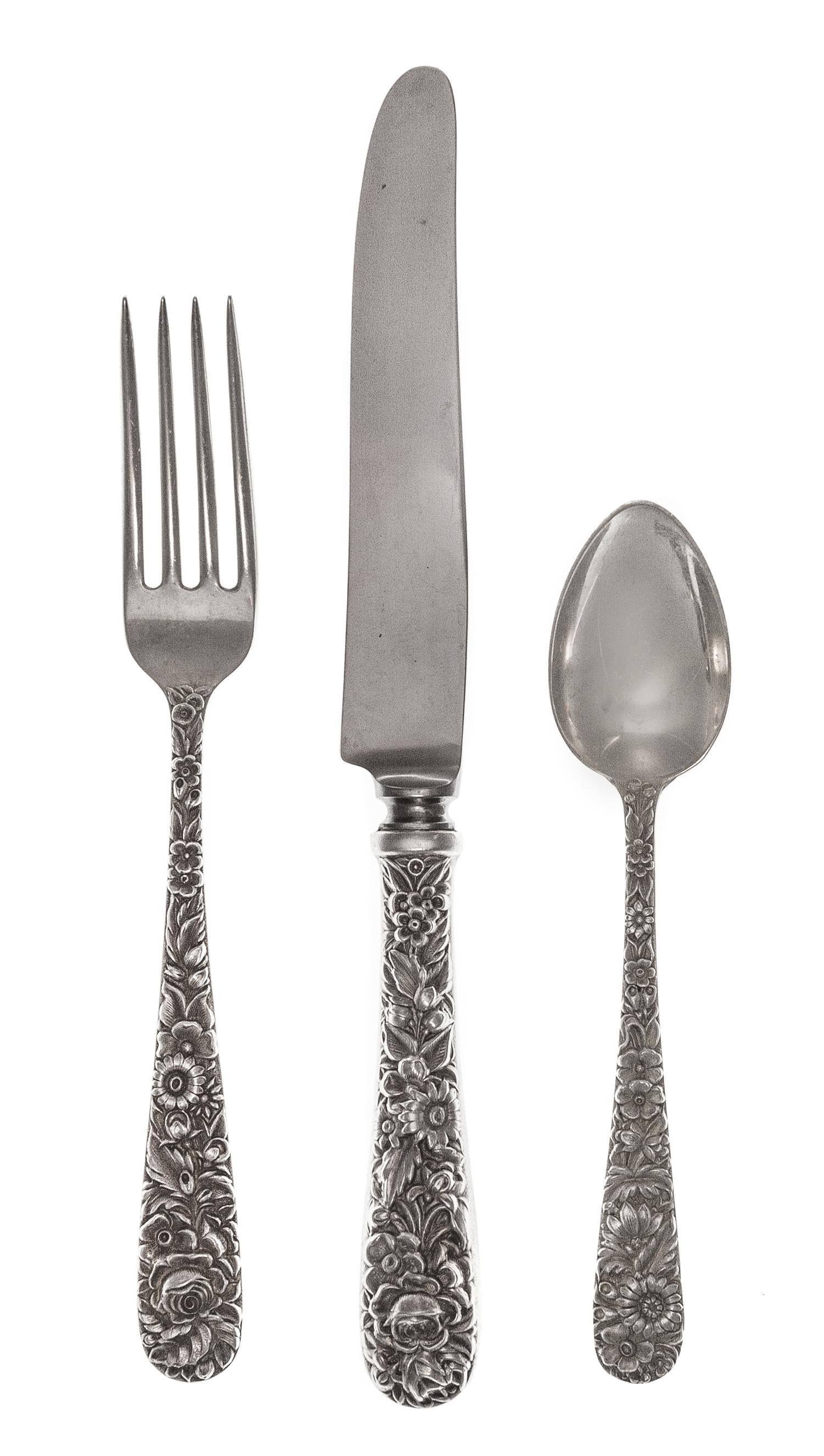 An American Silver Flatware Service, S. Kirk & Son, Baltimore, MD, Repousse pattern, comprising: 8 dinner forks 7 salad forks 8 soup sp