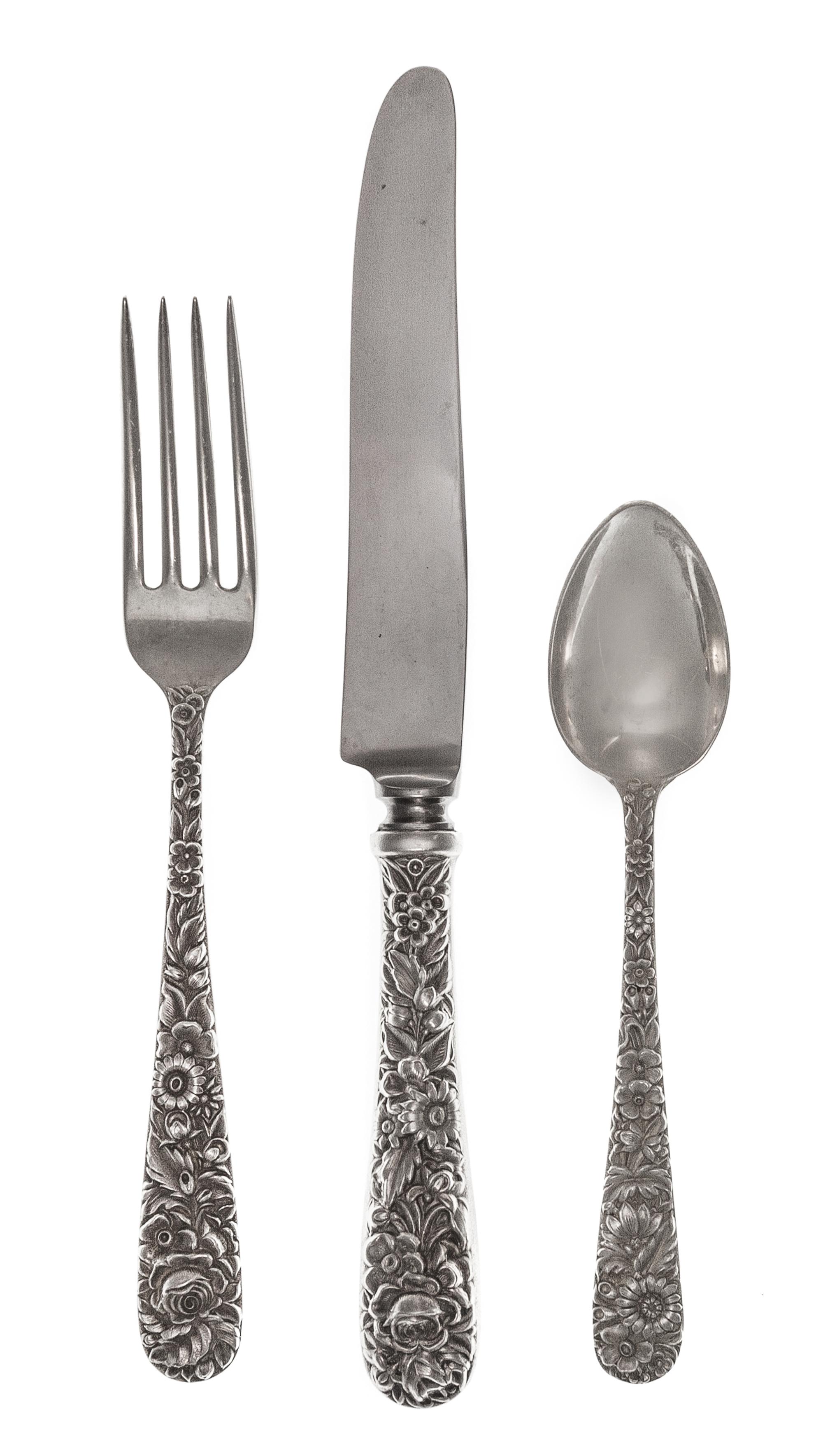 An American Silver Flatware Service, S. Kirk & Son, Baltimore, MD, Repousse pattern, comprising: 8 dinner forks 7 salad forks 8 soup sp