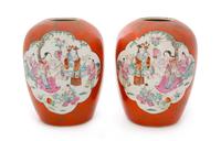 A Pair of Gilt Decorated Coral Red Ground Famille Rose Porcelain Jars Height 11 1/4 inches. — 19TH CENTURY
