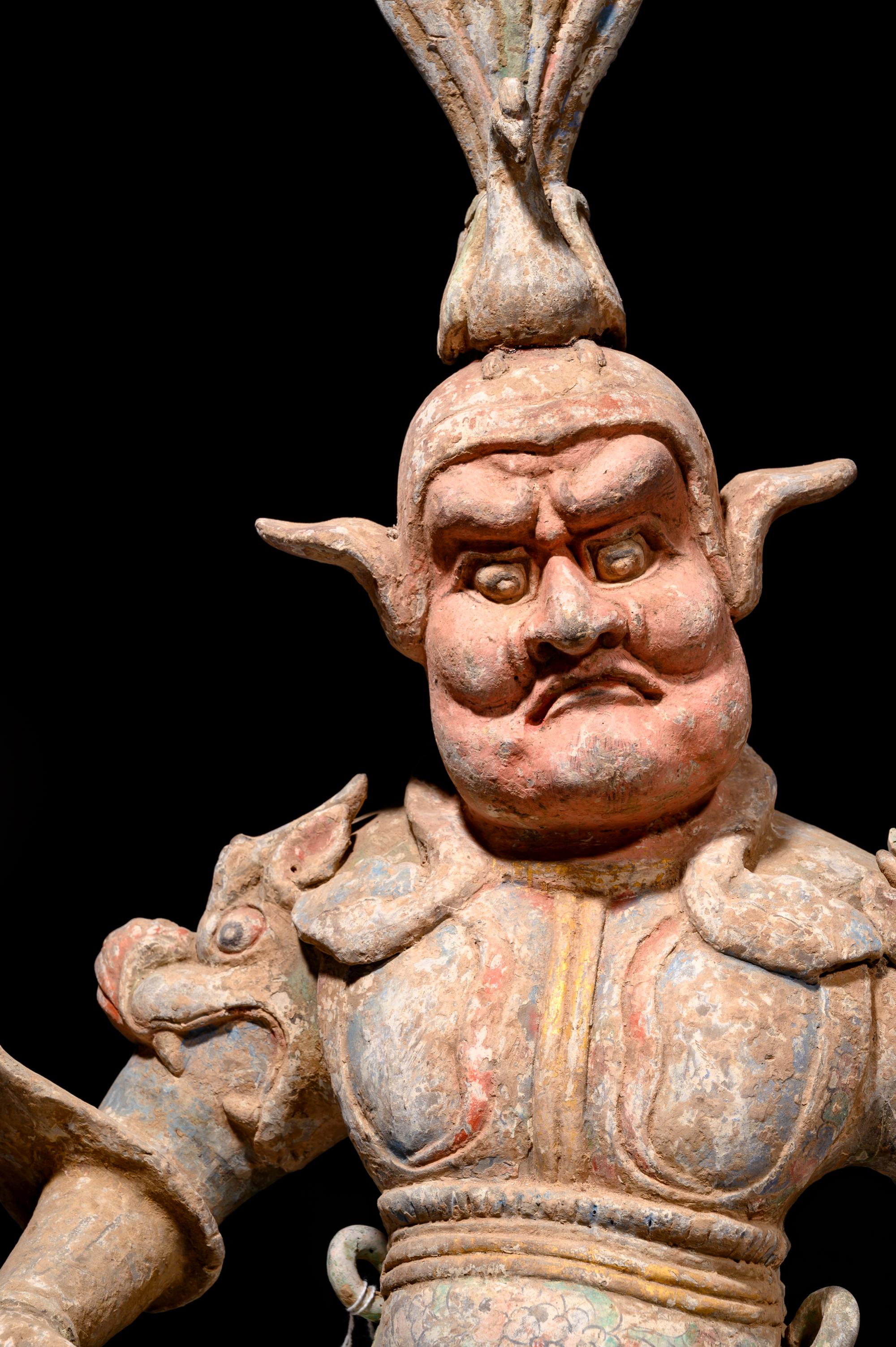 A Pair of Chinese Painted Pottery Figures of Guardians
