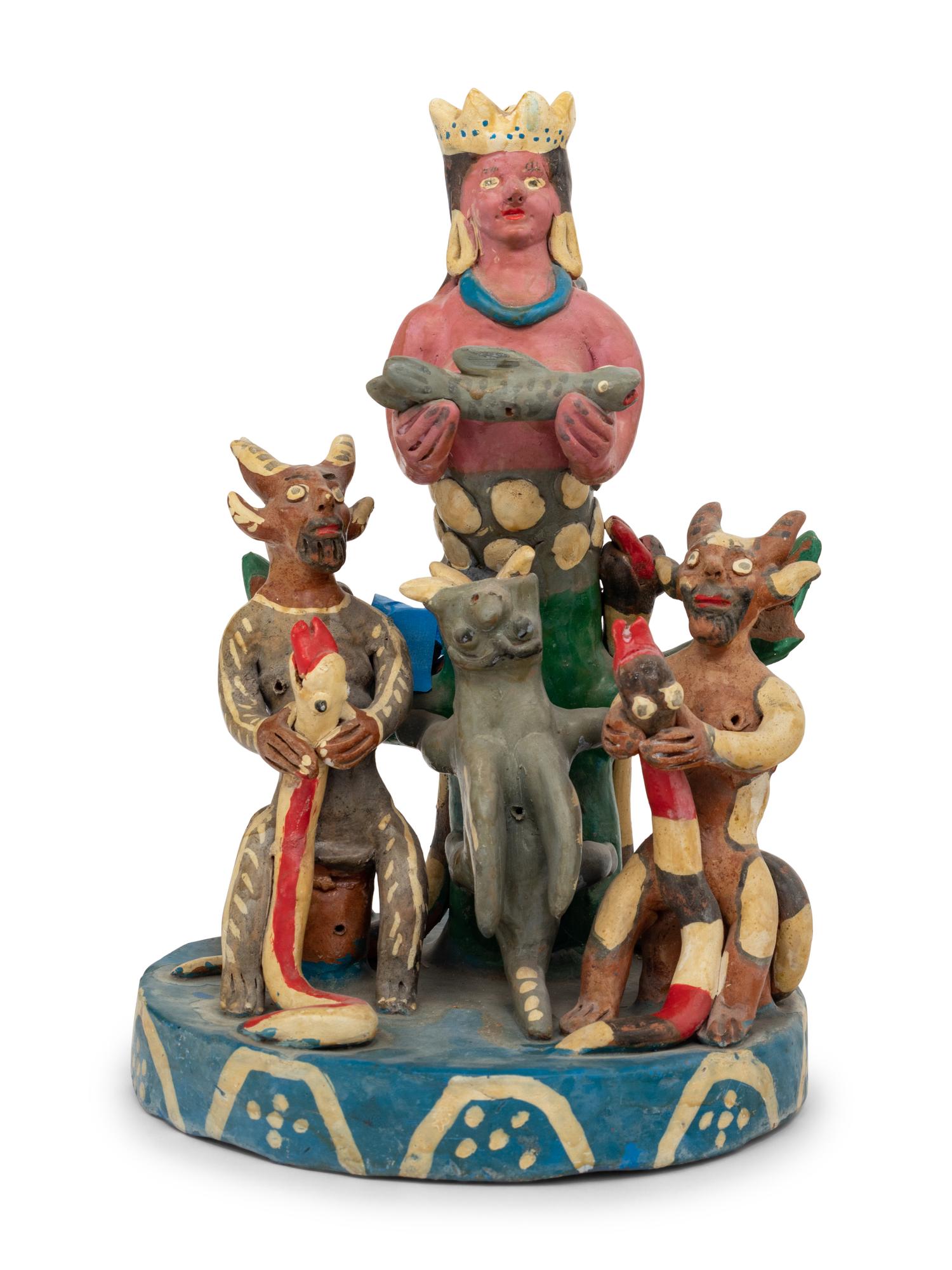 A Mexican Folk Art Polychrome Decorated Figural Group