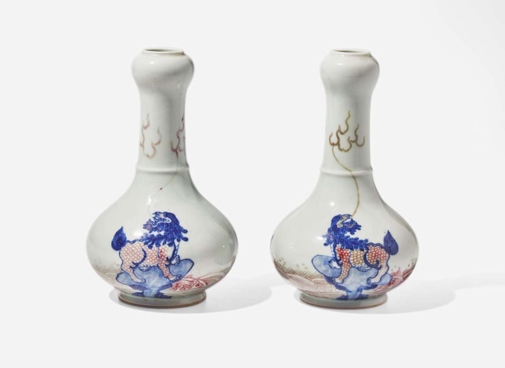 A pair of Chinese underglaze blue and red garlic-head cabinet vases, Kangxi marks 青花釉裡紅蒜頭瓶一對 康熙款