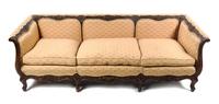A Louis XV Style Carved Walnut Canape, Width 86 1/2 inches.