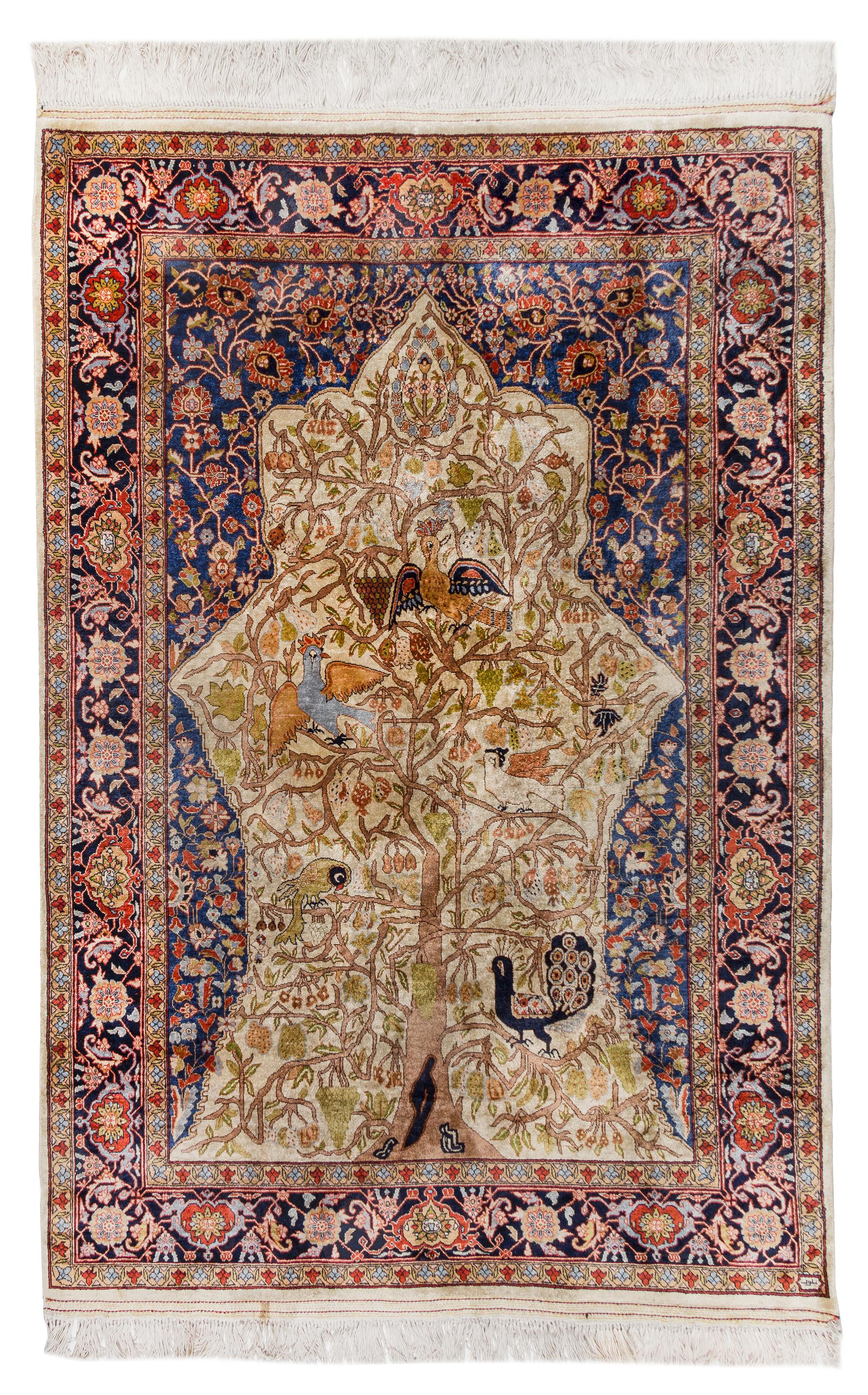 A Kashan Silk Tree of Life Rug 5 feet 2 inches x 3 feet 5 inches.