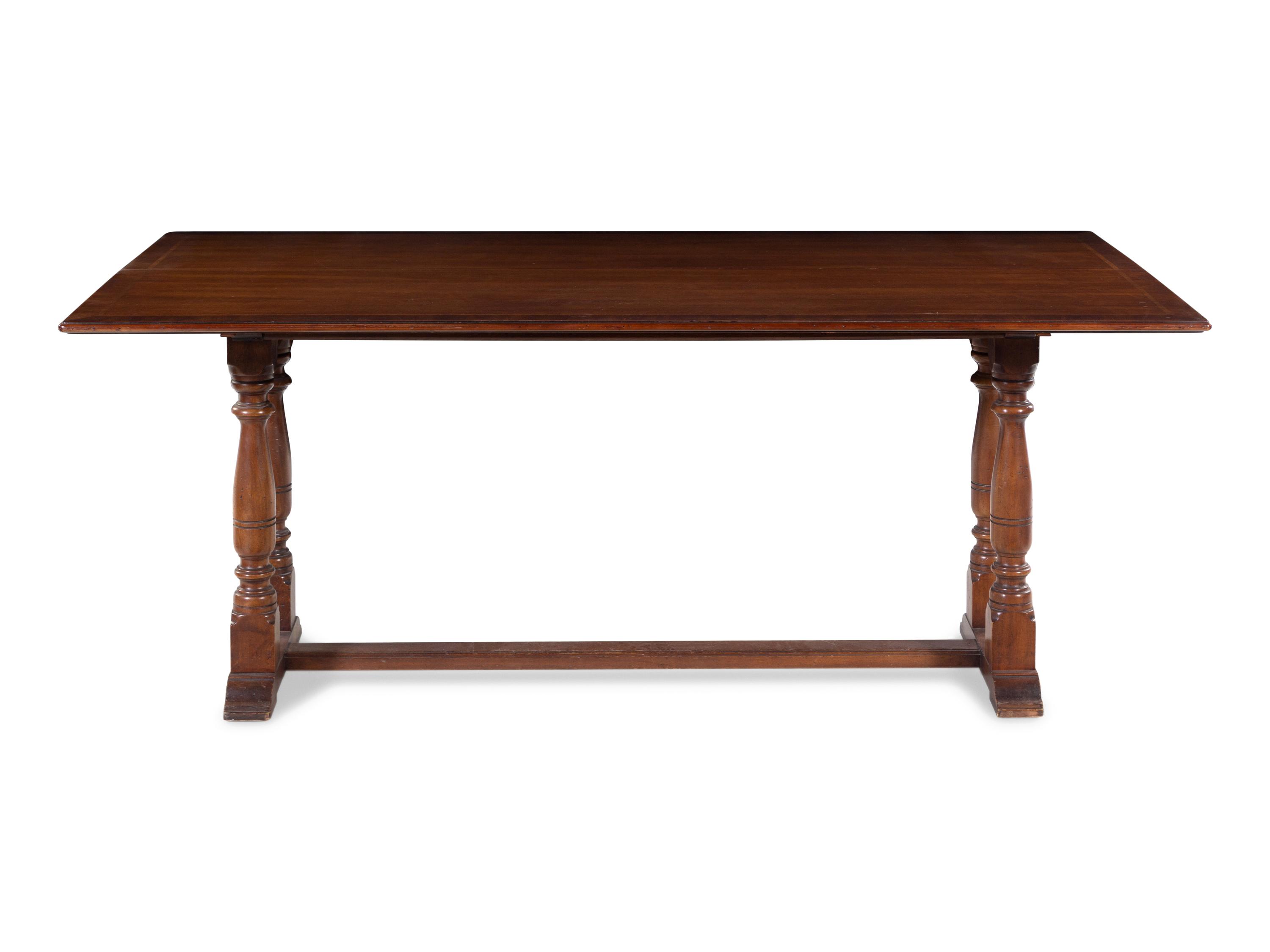 A Baroque Style Mahogany Extension Library Table