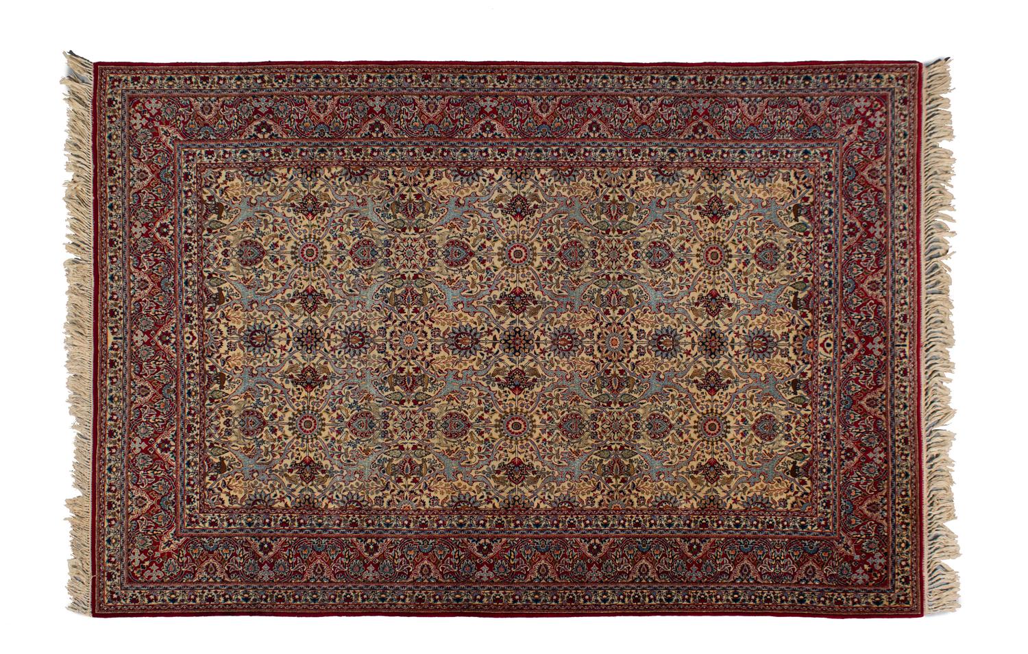 A Silk and Wool Tabriz Rug — 20TH CENTURY
