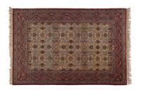 A Silk and Wool Tabriz Rug — 20TH CENTURY