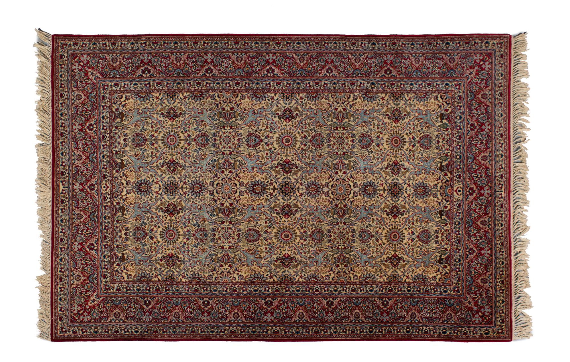 A Silk and Wool Tabriz Rug — 20TH CENTURY