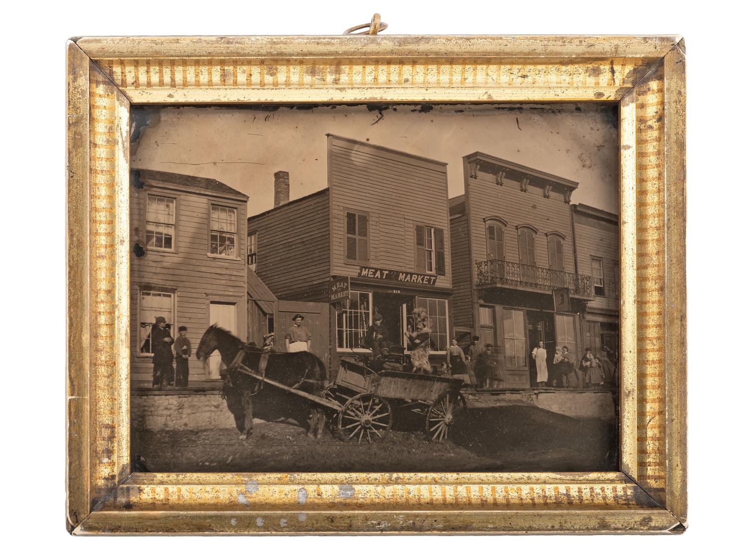 [EARLY PHOTOGRAPHY]. Rare pre-fire half plate ambrotype featuring West Van Buren Street in downtown Chicago. Ca 1860.