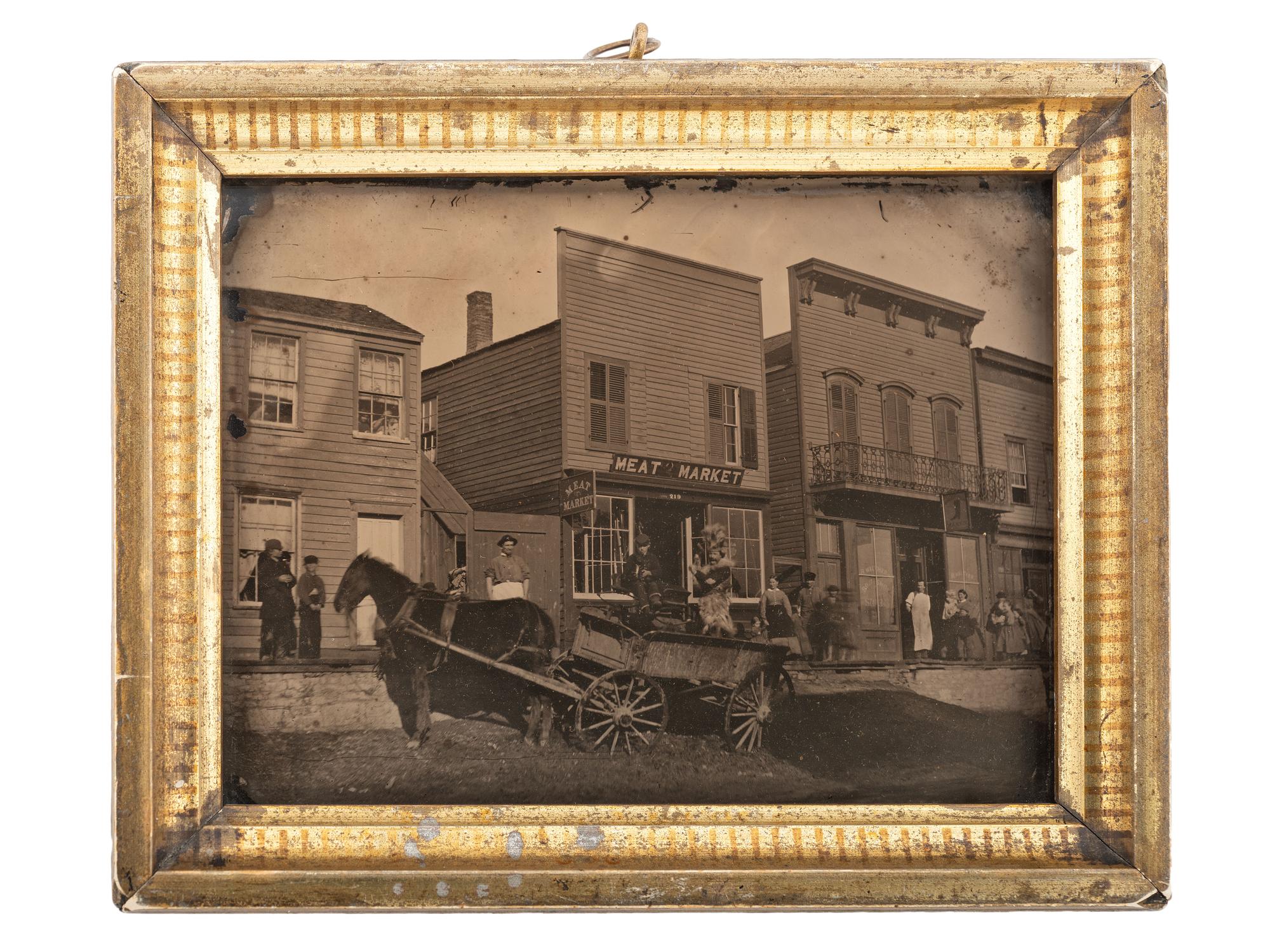 [EARLY PHOTOGRAPHY]. Rare pre-fire half plate ambrotype featuring West Van Buren Street in downtown Chicago. Ca 1860.