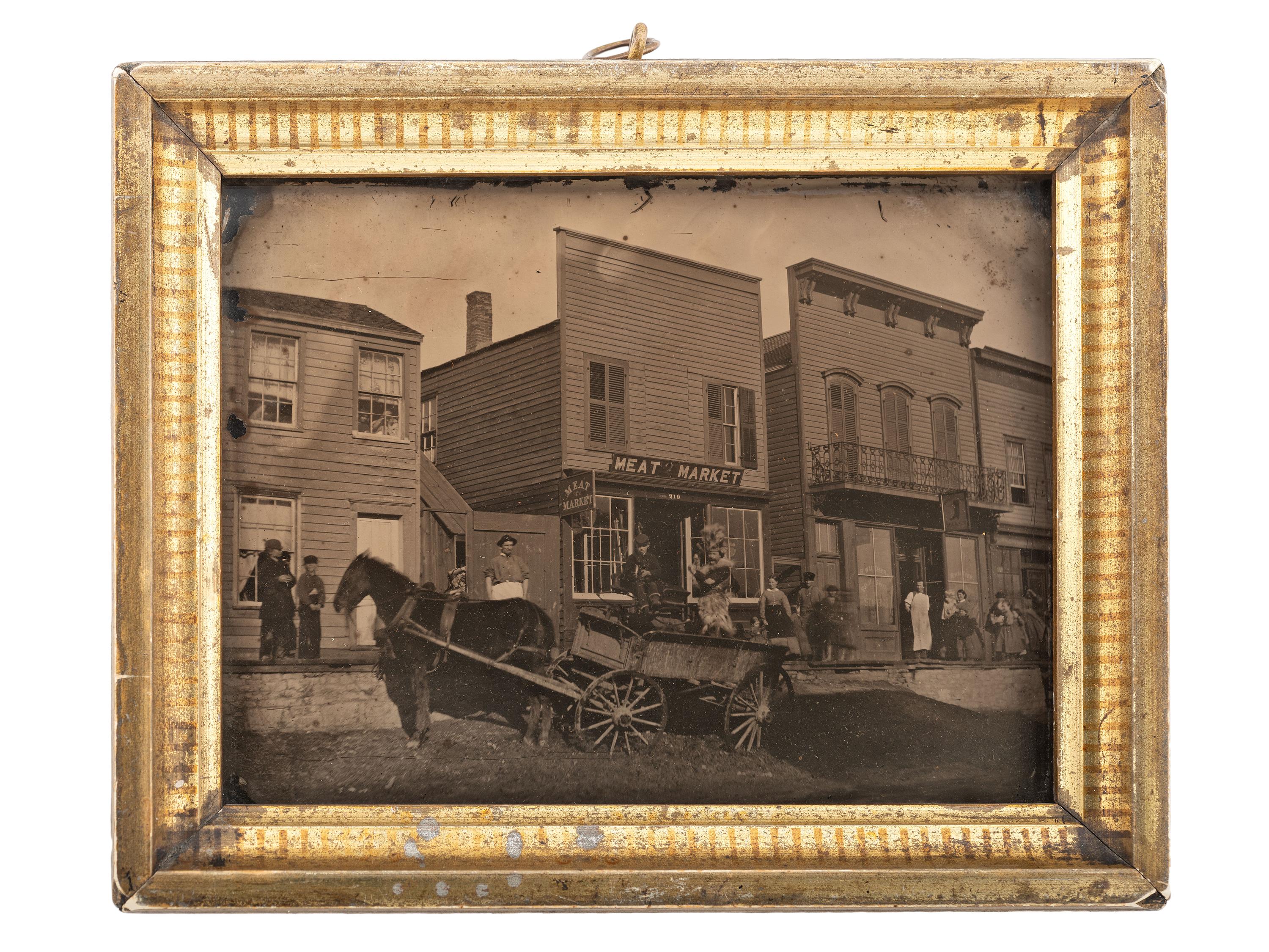 [EARLY PHOTOGRAPHY]. Rare pre-fire half plate ambrotype featuring West Van Buren Street in downtown Chicago. Ca 1860.