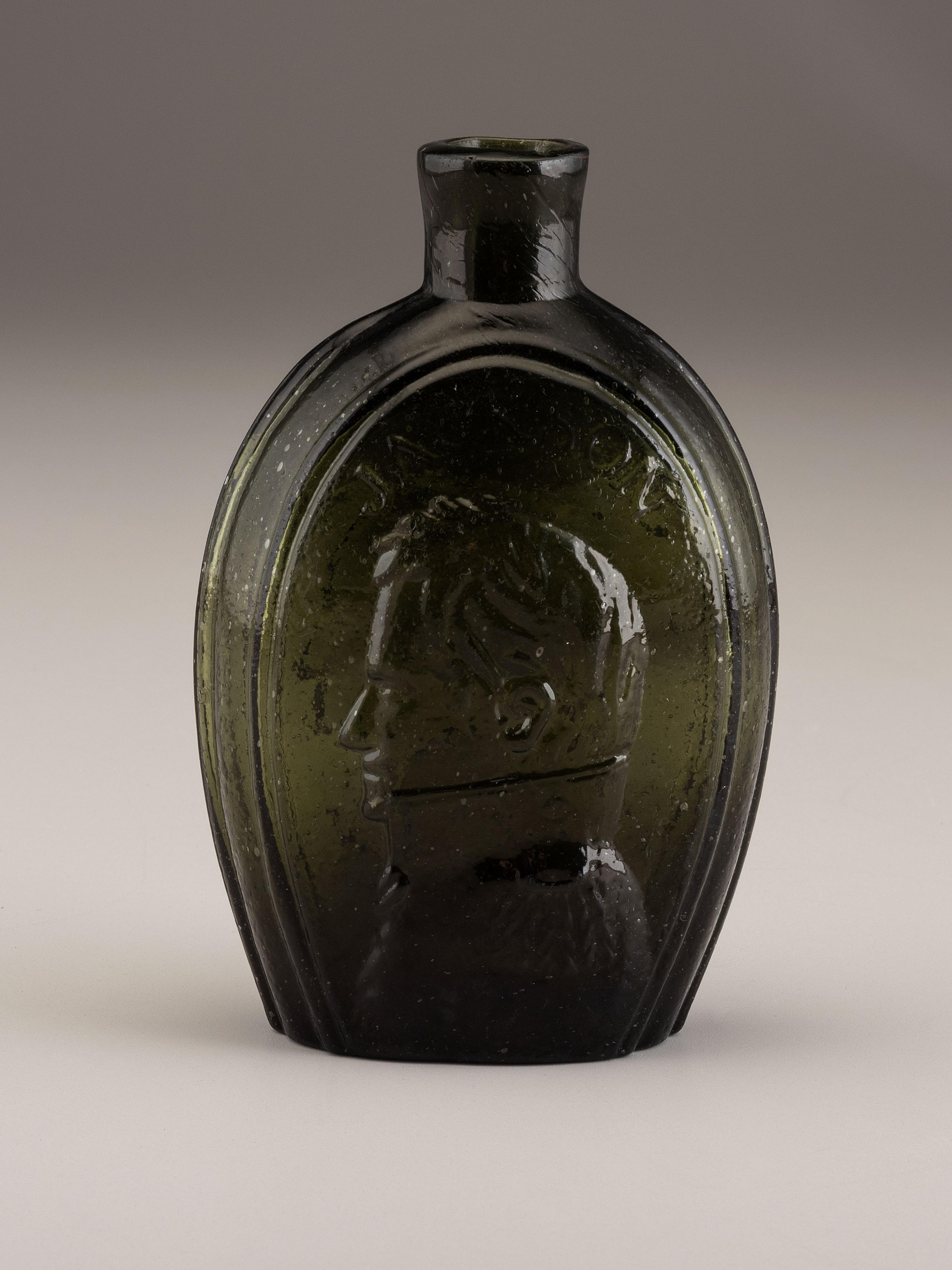A Molded-Glass Flask in Olive by Coventry Glass Works