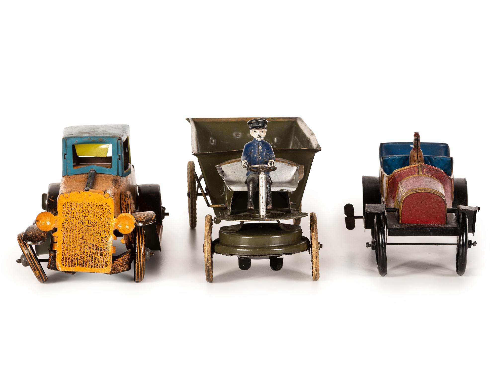 Three Painted Tin Vehicles