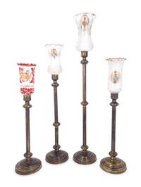 Four Brass and Enameled Glass Hurricane Candlesticks for the Persian Market